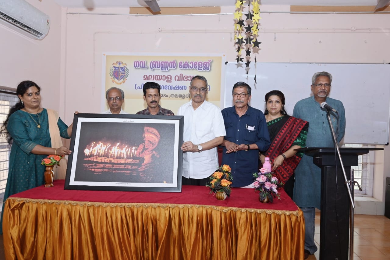 Felicitation accorded to N Prabhakaran former HOD of malayalam being awarded poorna literarry award,cross word award for regional writing translated in english,odakkuzhal award